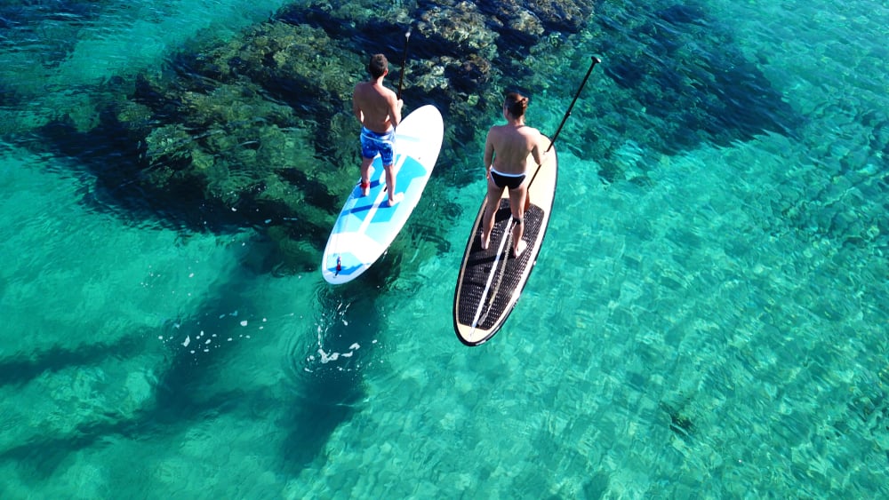 2 ragazzi che fanno paddle surf ibiza